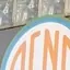 The emblem on The storefront sign, with small disc decals on the door glass, The Bend Store, April 8, 2020.
