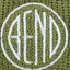 The emblem on Knit beanies in olive, yellow and black, the disc embroidered on each, The Bend Store, March 5, 2021.