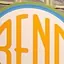 The emblem on The shop window at night: the disc sign, and hoodies and tees carrying the disc, The Bend Store, March 8, 2022.