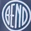 The emblem on Two children in grey and blue hoodies carrying white discs, The Bend Store, May 28, 2022.