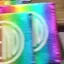 The emblem on The shop window in reel frames: koozies, a tee, mugs and a beanie, all carrying the disc, The Bend Store, June 1, 2023.