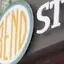 The emblem on The snowy storefront in reel frames, the disc sign in the middle and the last, The Bend Store, January 13, 2024.