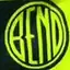 The emblem on A hi-vis association safety vest, from behind, on the flower-basket crew, Downtown Bend Business Association, June 14, 2025.