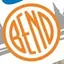 The emblem on A tray of buttons, with the shop’s card carrying an orange disc in the corner, The Bend Store, October 2, 2025.