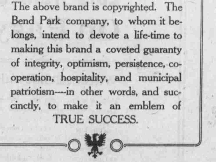 The notice beneath the emblem sets out the company’s aspirations for it.