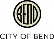 Thin black BEND letters enclosed by a heavy circle, above the words City of Bend.