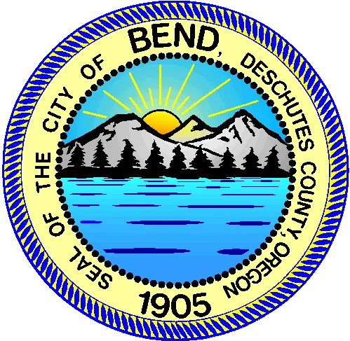A circular municipal seal with mountains, a sunburst and a river, ringed by the words Seal of the City of Bend, Deschutes County, Oregon, and the year 1905.