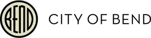 A cream ring enclosing the word BEND in narrow letters with an arched third letter.