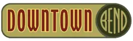 The word DOWNTOWN in red slab letters beside a dark green disc containing BEND in broad gold letters.