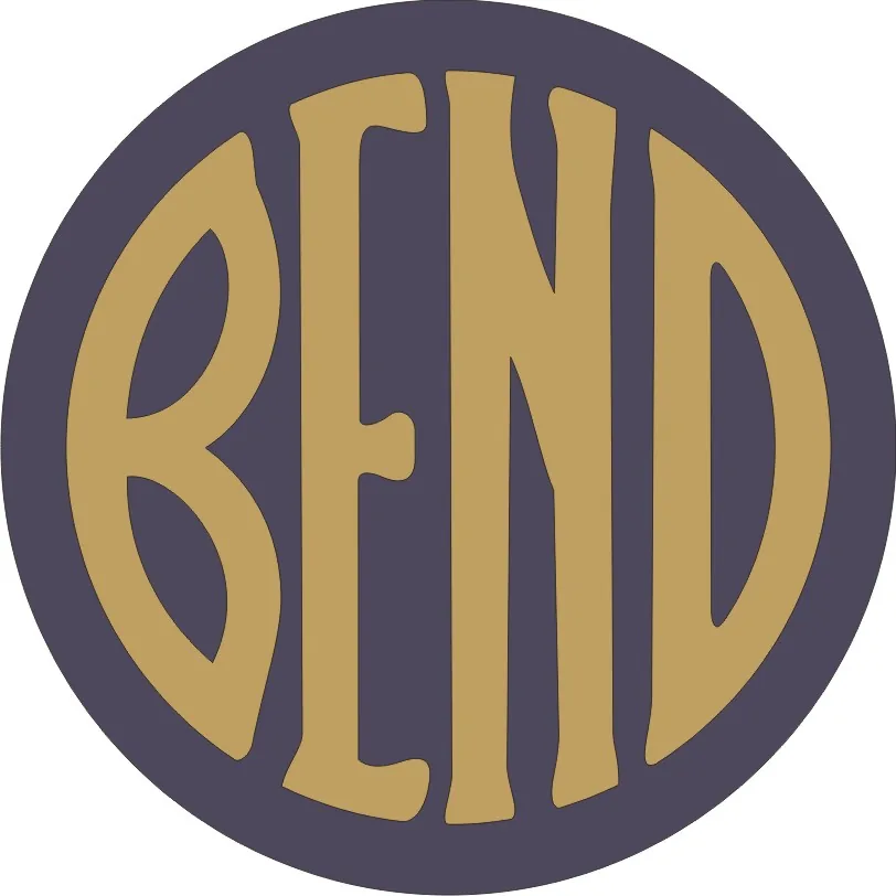 A blue disc with the word BEND in broad gold letters filling the circle.