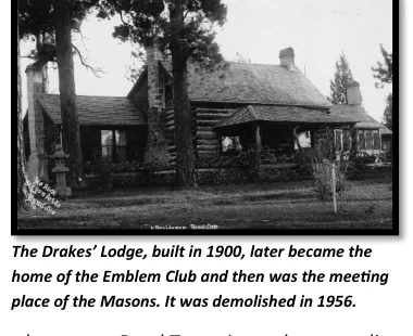 A black-and-white photograph of the Drake lodge beneath tall pines, with the museum’s caption below.