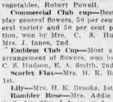 A newspaper prize list giving the Commercial Club cup for the best general display and the Emblem Club Cup for the most artistic arrangement of flowers, both won by Mrs. C. S. Hudson.