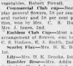 A newspaper prize list giving the Commercial Club cup for the best general display and the Emblem Club Cup for the most artistic arrangement of flowers, both won by Mrs. C. S. Hudson.