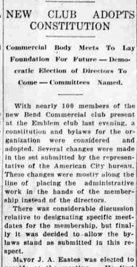 A newspaper column headed “New Club Adopts Constitution”, reporting that nearly 100 members met at the Emblem club to adopt a constitution and bylaws.