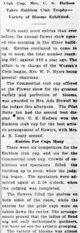 A newspaper column reporting the annual flower show, recording that Mrs. C. S. Hudson won the Emblem club cup for the best artistic arrangement of flowers and that there were six competitors for it.