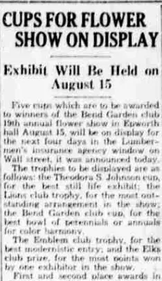 A newspaper column listing cups for the flower show, including the Emblem club trophy for the best modernistic entry.