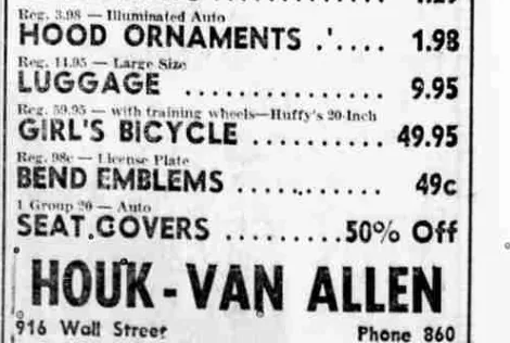 A newspaper sale advertisement listing hand saws, hood ornaments, luggage, a bicycle, and a line reading “Reg. 98c — License Plate BEND EMBLEMS … 49c”, above the store name Houk-Van Allen, 916 Wall Street.