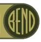 The word DOWNTOWN in red slab letters beside a dark green disc containing BEND in broad gold letters.