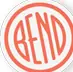 An orange ring enclosing the word BEND in narrow letters, the third a capital N, beside the words BEND OREGON.