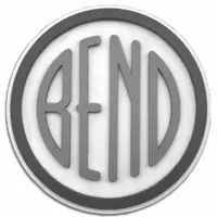 A grey emblem with relief shading: narrow letters spelling BEND inside a heavy grey ring on white.