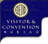 A dark blue header panel with a cream roundel enclosing the word BEND in narrow letters, above the words VISITOR & CONVENTION BUREAU.